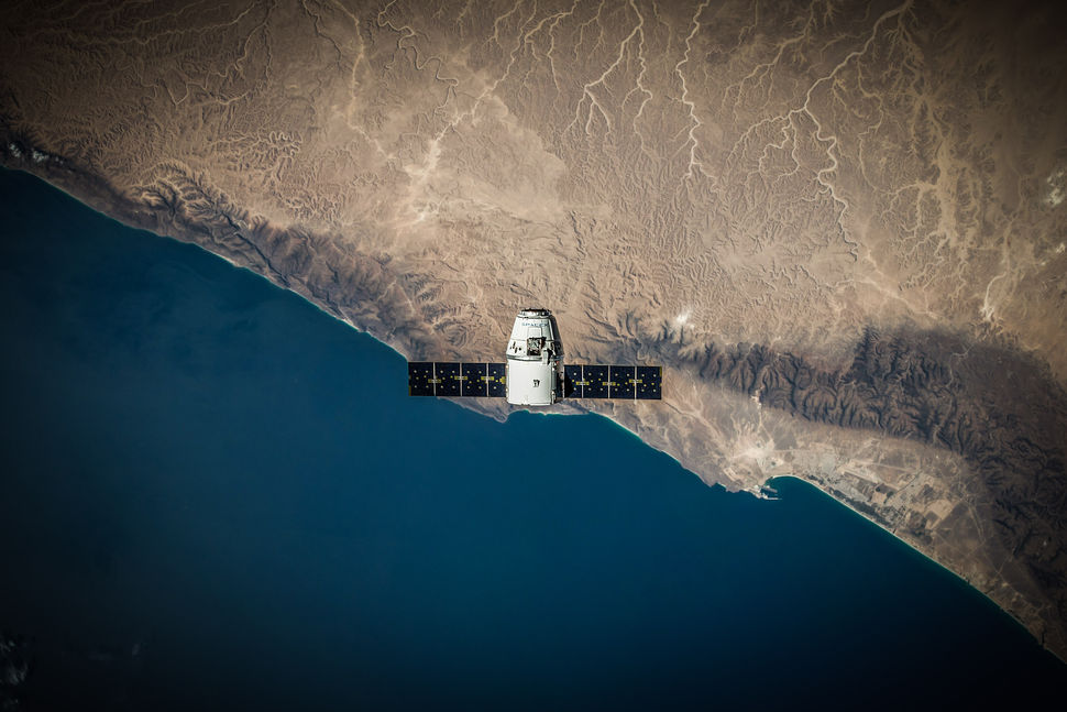 A SpaceX Dragon capsule in orbit around Earth, as part of the CRS-5 mission. Credit: SpaceX